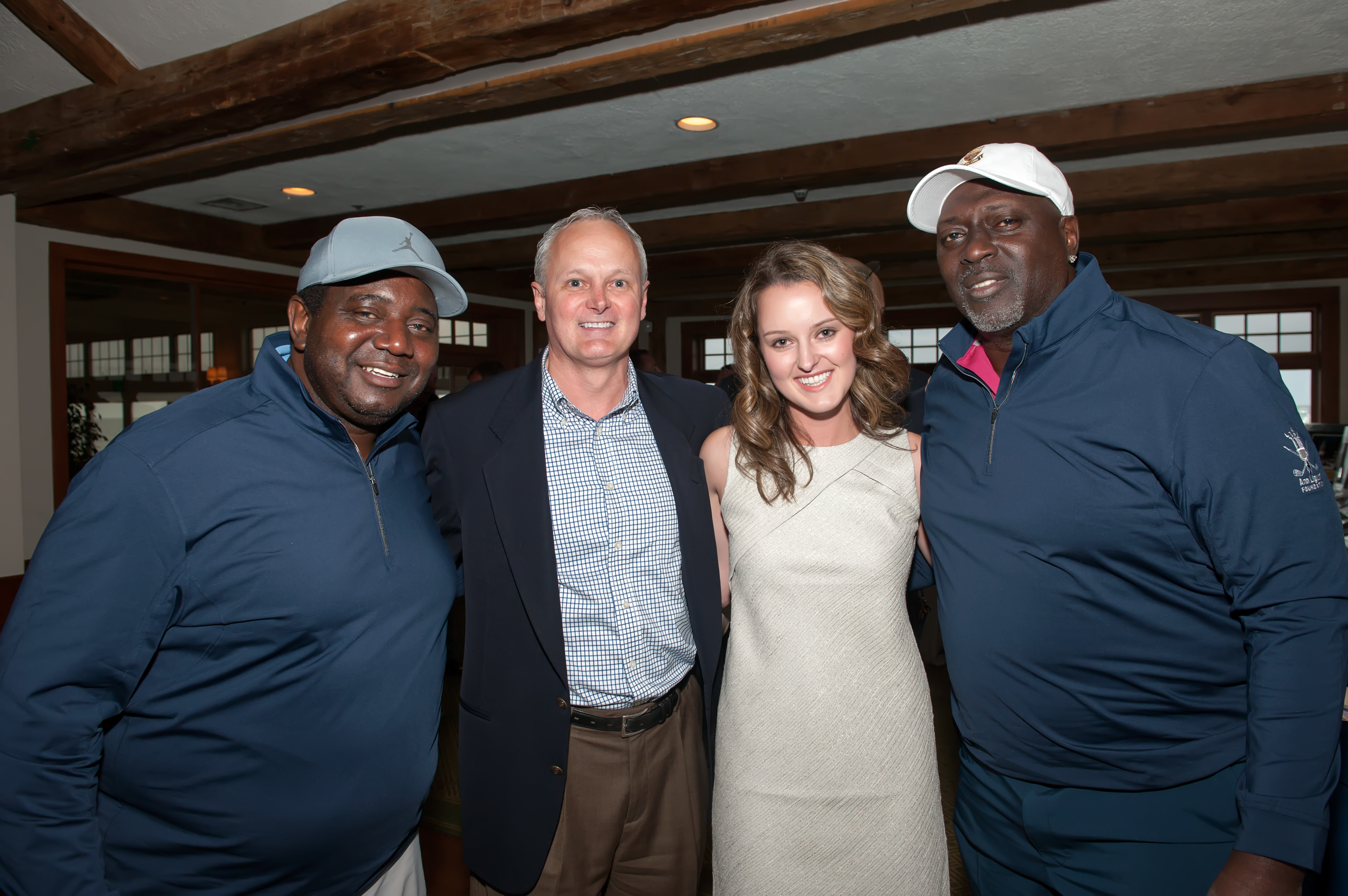 Gene Toliver, Joe & Allison Waddington,  and 2-time Super Bowl Champ & Celebrity Auctioneer,  Ottis Anderson- Photo by Daniel Gonzalez