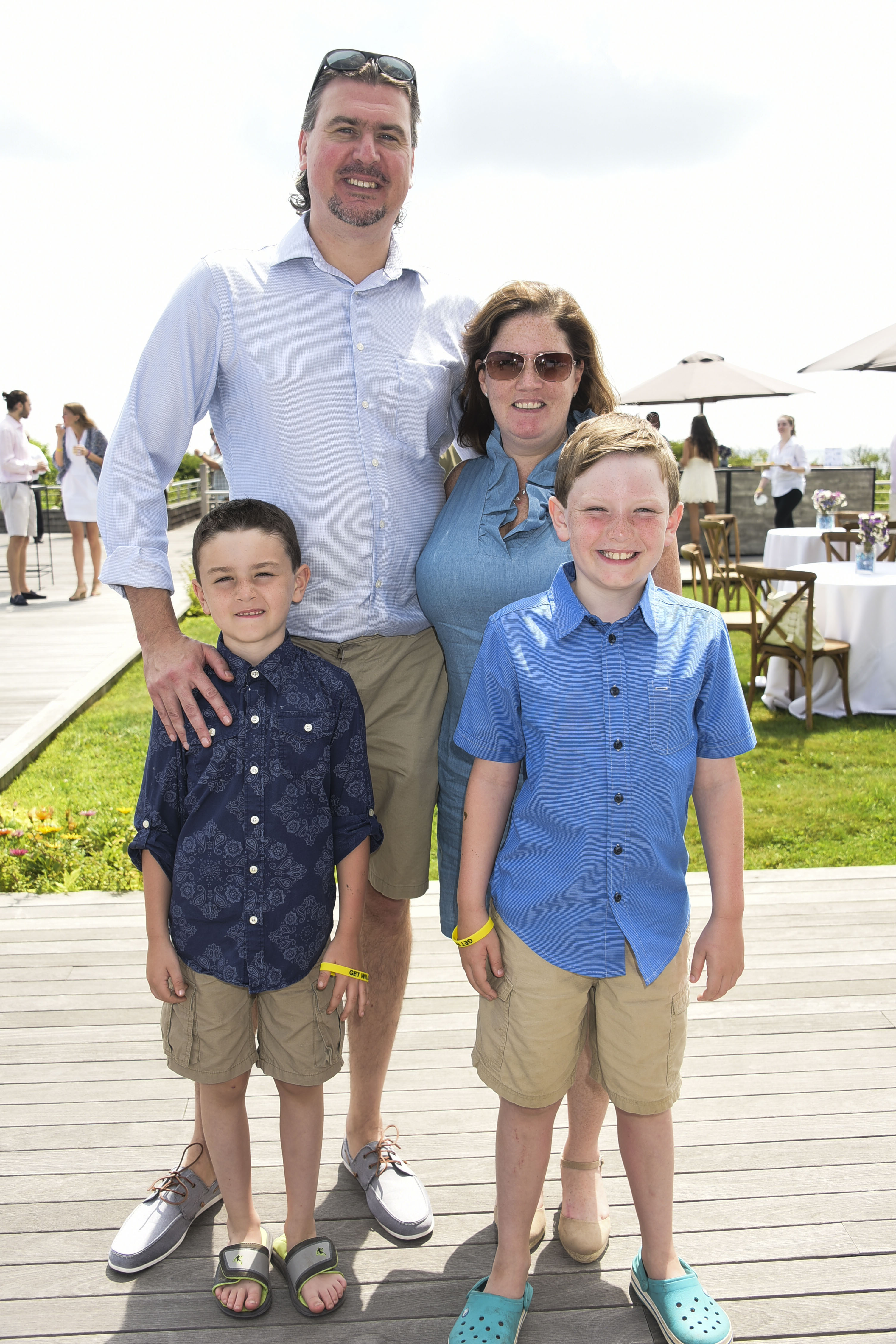 Conner Molnar, Honorees  Dr.Justin Molnarand  Amy Molnar, and Brendyn Molnar attend the 11th. Annual Get Wild! Summer fundraiser to benefit the Evelyn Alexander Wildlife Rescue Center of the Hamptons at the private ocean front residence of Liz Brown and Leslie Alexander in Southampton on August 13, 2017. photo by Rob Rich/SocietyAllure.com ©2017